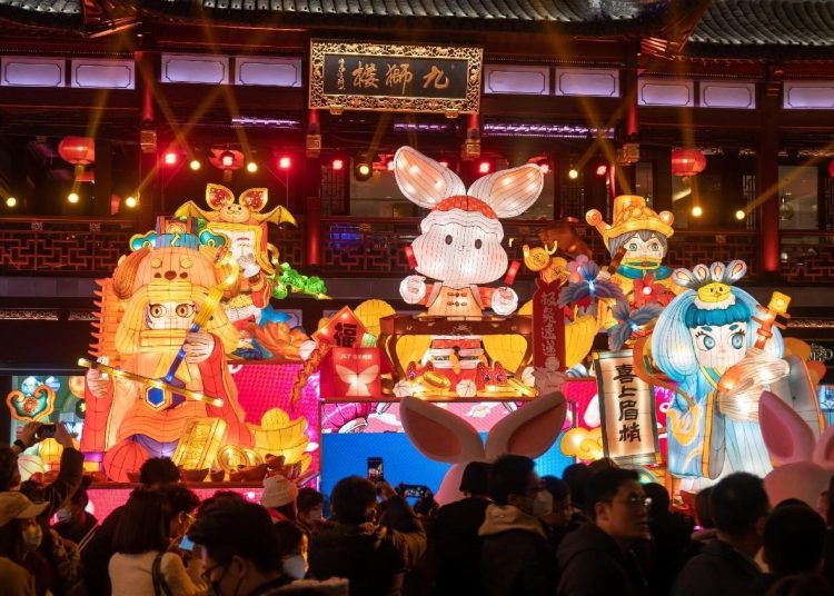 People across China celebrate upcoming Chinese New Year of the Rabbit